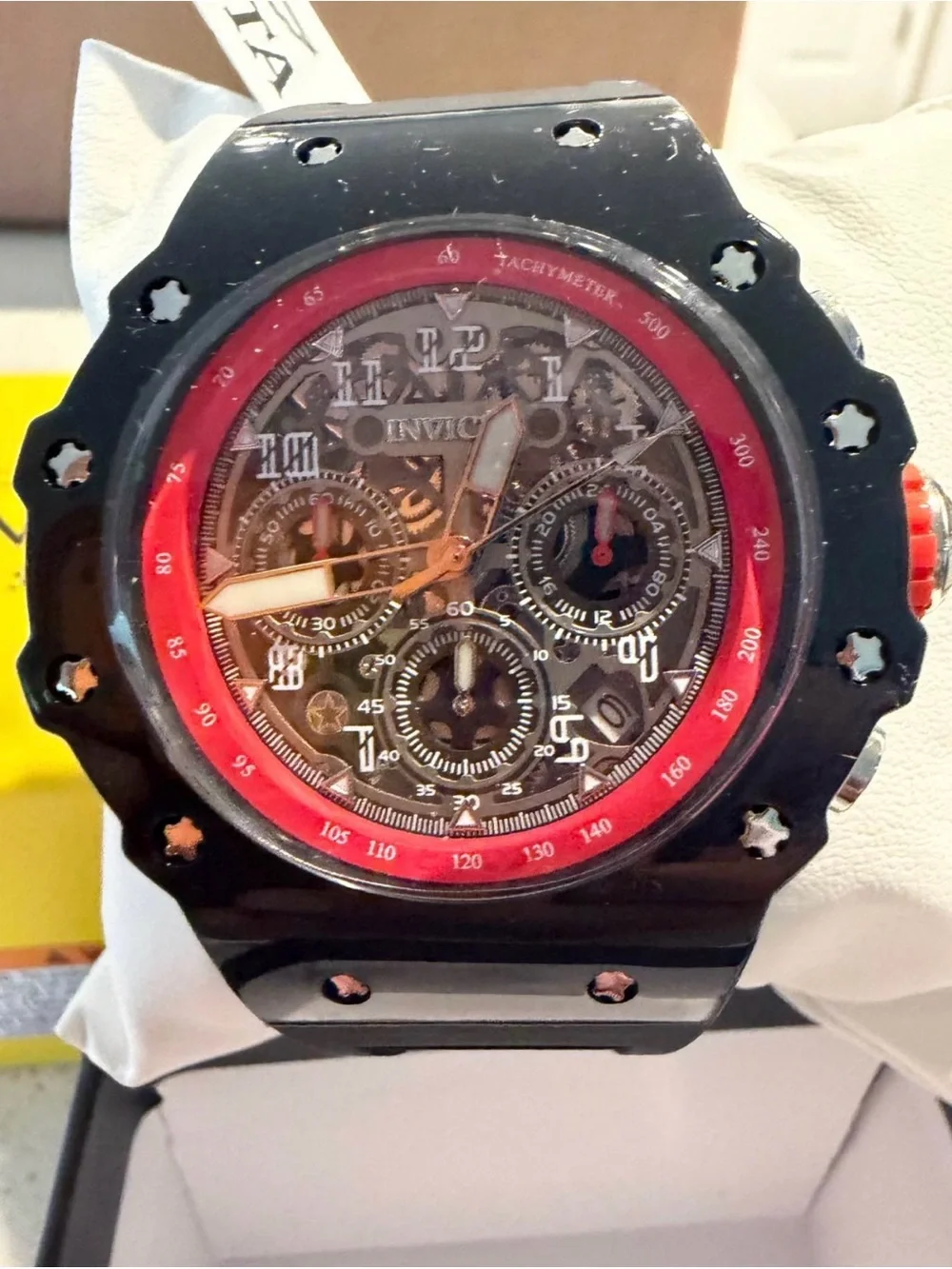 Invicta Racing Black Watch with Red Accents and Skeleton Dial